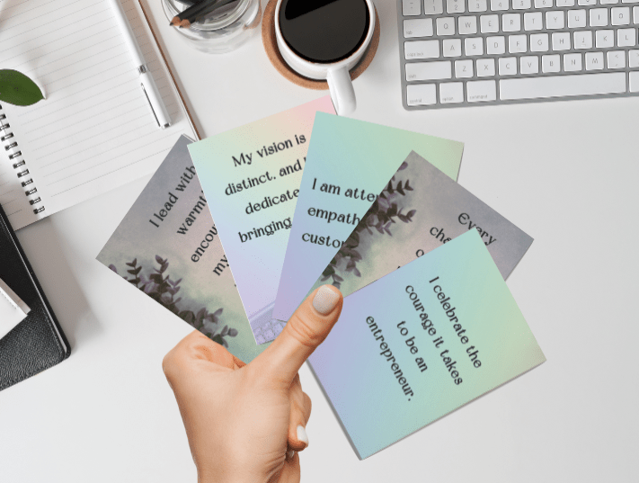 image of a hand holding Soulful Entrepreneur Affirmation Cards by incogneato ink
